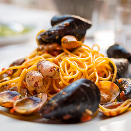 Italian pasta with seafood and herbs