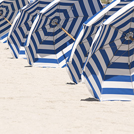 Miami Beach Rows of Blue and White Striped Umbrellas